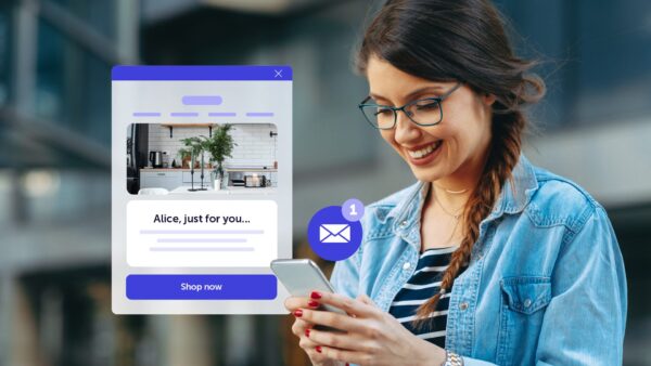 Happy female customer reading a personalized email in their inbox