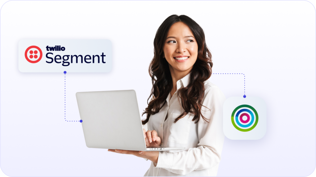 Woman with laptop smiling about Dotdigital integration with Twilio Segment